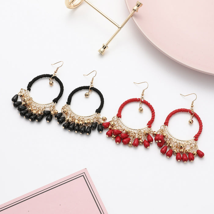 European and American ethnic style handmade woven earrings Bohemian retro round water drop tassel earrings