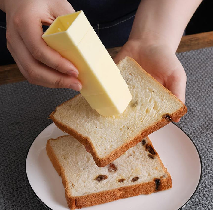 Hand Holding Rotary Roll Out Butter Spreader Kitchen Gadgets Baking Butter Spreader