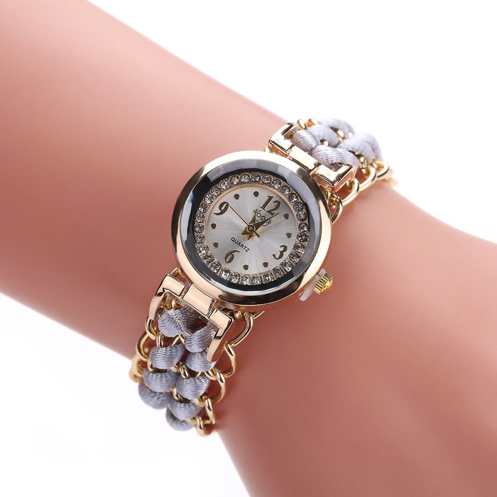 Nuevo reloj de cuerda tejida con esfera pequeña con incrustaciones de diamantes para mujer, reloj de cuarzo con cuerda retráctil de moda creativa para mujer