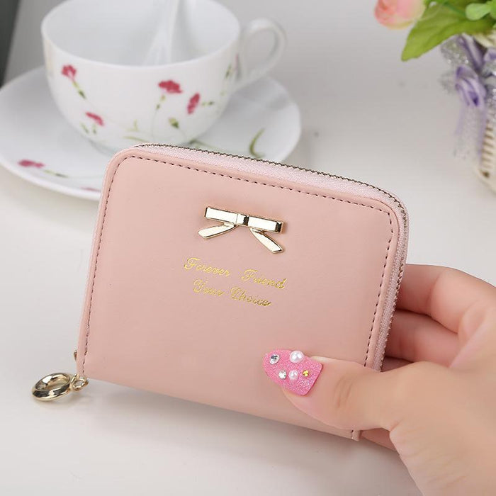 Nuevo diseño de moda, carcasa para monedas para mujer, billetera bonita y plegable, Mini cremallera corta alrededor del bolso, monedero de cuero PU de buena calidad